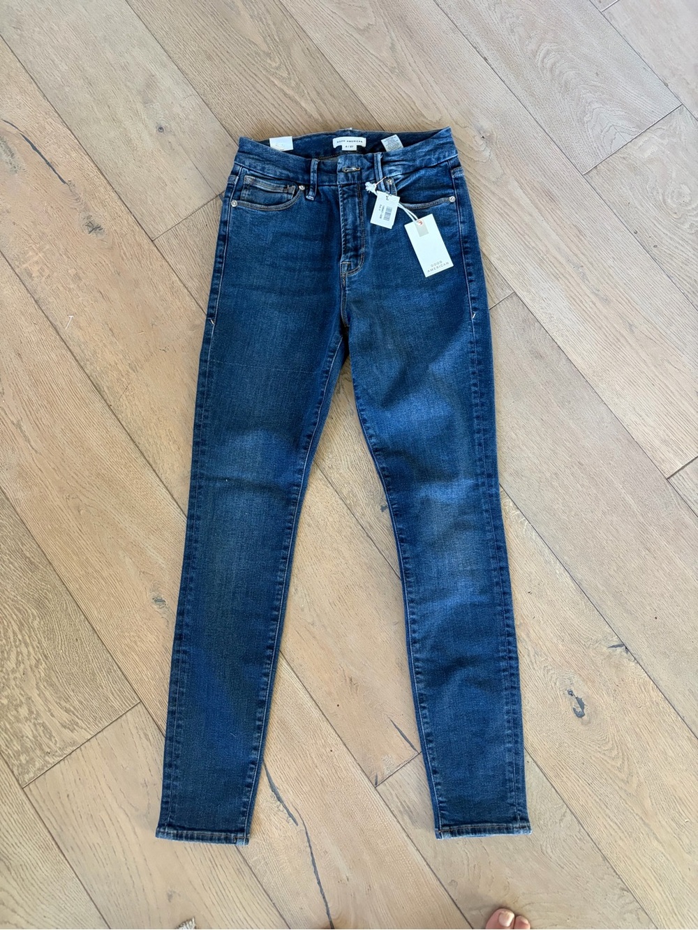 Good American woman’s Blue High-Rise Skinny Jeans.